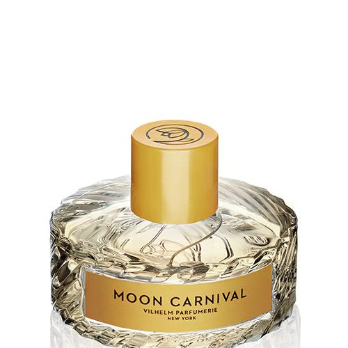 An upper view of a a clear glass perfume bottle with a textured design, featuring a yellow cap and label on the front.